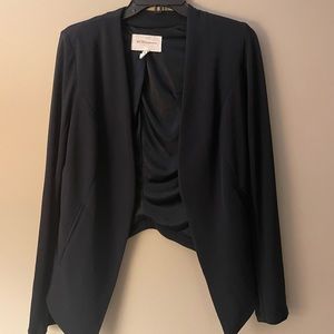 BCBGeneration navy blazer. High low design. Size small.